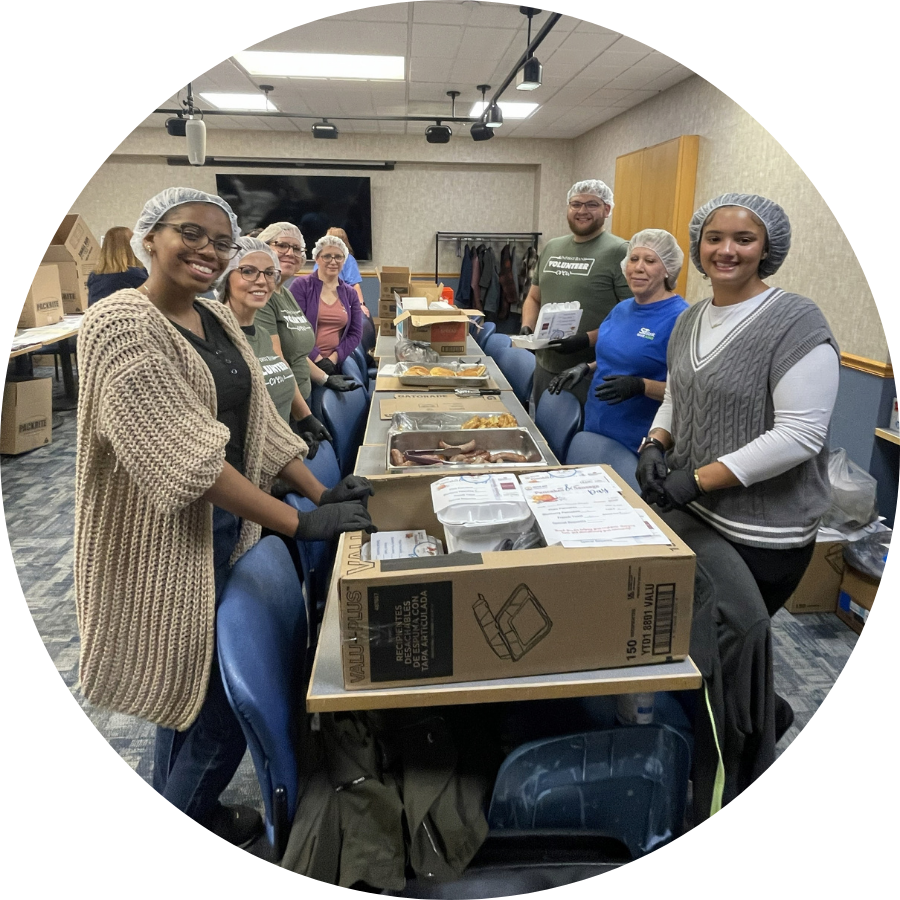 Volunteers packing meals at 2025 Pancake & Sausage Day