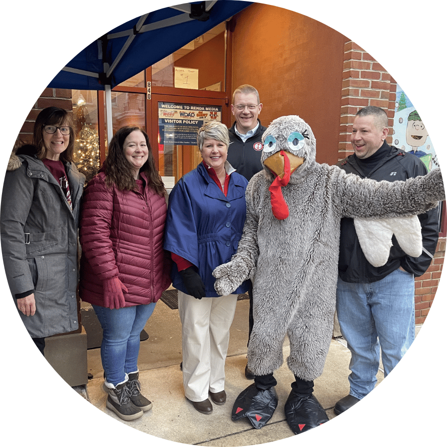 A groups of volunteers collecting donations for Turkeython outside of the radio station.